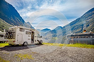 Geiranger fjord, Norway. Family vacation travel RV, holiday trip in motorhome, Caravan car Vacation