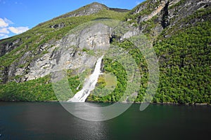 Geiranger Fjord is a UNESCO World Heritage Site in the Sunnmøre region of Møre og Romsdal county, Norway