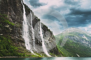 Geirangerfjord, Norway. The Seven Sisters waterfalls In Geirangerfjorden. Famous Norwegian Landmark And Popular
