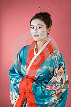 Geisha Asian woman facepaint in yukata kimono