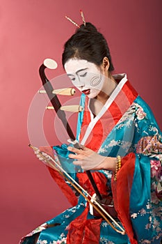 Geisha in kimono with erhu