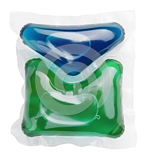 Gel capsule with laundry detergent on white