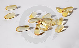 gelatin capsules containing omega 3 derived from fish products. photo