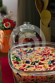 Gelatin in colors, sweet very famous in Brazil. Brazilian candy on the wood table kitchen