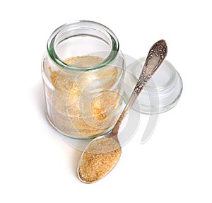 Gelatin or gelatine in the glass jar. On white background. photo