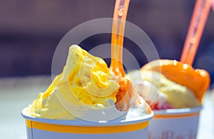 Gelato italian ice cream on the street in rome mango pistachio ice cream