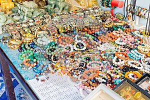 Gemstone bead bracelets were made from Myanmar and sold at Shingkhorn border cehckpoint market Prachuabkhirikhan Thailand December