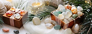 Gemstone Healing Crystal Christmas Gifts. Many Healing Crystals and gift box with Christmas decor. Authentic Gemstones and