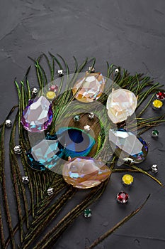 Gemstones crystals scattered on a dark background