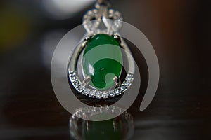 Gemstones jewelery Is a white gold pendant necklace. Set with diamonds and Green jade, rare,
