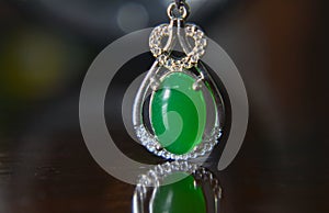 Gemstones jewelery Is a white gold pendant necklace. Set with diamonds and Green jade, rare,