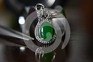 Gemstones jewelery Is a white gold pendant necklace. Set with diamonds and Green jade, rare,