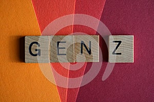 Gen Z, word in 3D wooden alphabet letters isolated on colour background photo