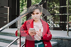 Gen z, social media, influencer, technology, youth millennial people concept. Young brunette girl with short hair using