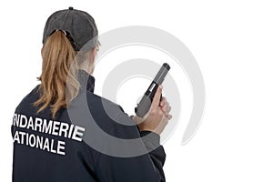 Gendarme woman back view isolated on a white background