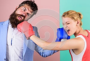 Gender battle. Gender equal rights. Family quarrel. Boxers fighting in gloves. Domination concept. Gender equality. Man