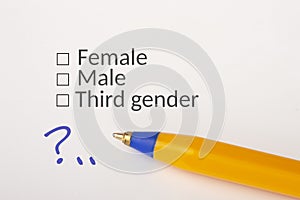 Gender - checkbox with a tick on white paper with yellow pen. Checklist concept