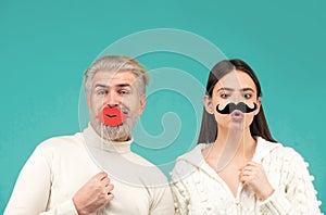 Gender, equality diversity concept. Male female portrait. Funny couple of woman with moustache and man with red lips