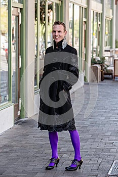 Gender Fluid Young Man in Coat