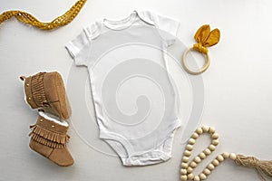 Gender Neutral Blank White Baby Bodysuit Flat lay Mockup photo