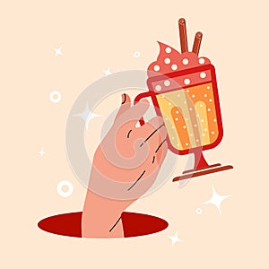 Gender neutral hand holds a mug of hot cocoa. Concept design for a cafe or non alcoholic toast. Sweet cocktail with