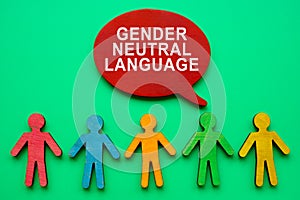 Gender neutral language inscription and colorful figurines.