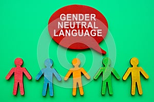 Gender neutral language inscription and colorful figurines. photo