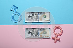 Gender pay gap. Male and female symbols with dollar banknotes on color background, flat lay