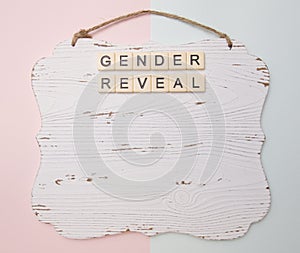 Gender reveal on a wooden plank