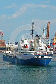 General cargo ship and port crane
