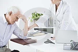 General doctor examining weak outpatient photo