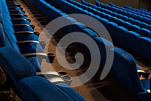 General plan of empty blue cinema seats. Deserted movie theater. Watching the movie. New movie