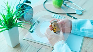 General practitioner holding unlabeled bottle of various pills a