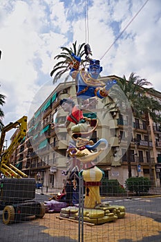 General view of a fallero monument during the day of the plant in a Valencian square (Spain