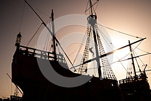 General shot, in silhouette, of an old caravel