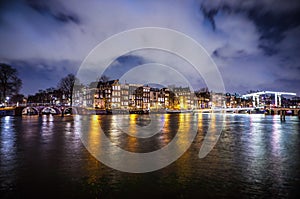 General view of beautiful night Amsterdam city canals