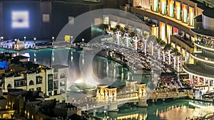 A general view of the bridge over man-made lake timelapse in Dubai downtown, United Arab Emirates.