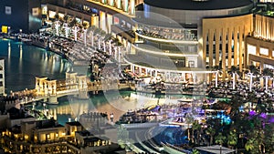 A general view of the bridge over man-made lake timelapse in Dubai downtown, United Arab Emirates.