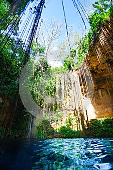 General view of Ik-Kil cenote with blue water