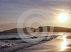 Waves of the Atlantic Ocean at Geriba beach on sunset in Buzios photo