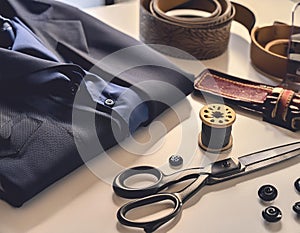 The tools for the job for Dressmaker placed on the white table