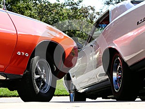 A pair of Pontiac GTOs