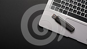 Modern Technology: Laptop with External USB Memory Disk â A Minimalist Setup