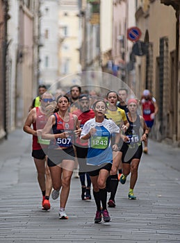 athletes run during a competitive marathon