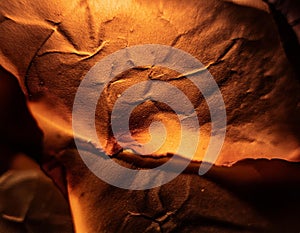 Paper background. Burning paper texture suitable as background.