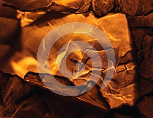 Paper background. Burning paper texture suitable as background.