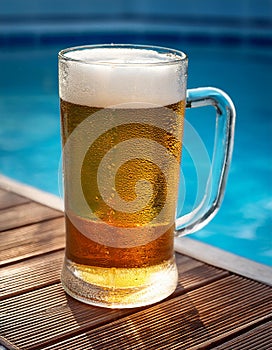 Beer-shot. A beer at the pool.