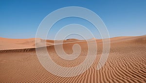 Desert concept, sand dune and blue sky