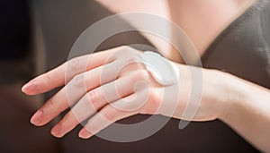 Cream on the women hand.