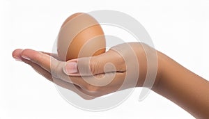 Female teen hand holding egg, isolated on white